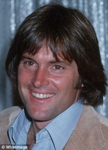 Smiling person with dark hair and jacket.